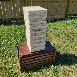 Not-so-Giant Tumbling Tower (Jenga) with stained crate